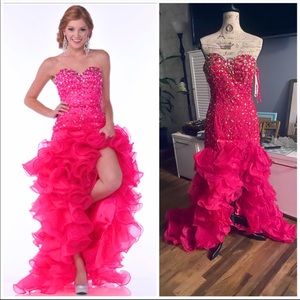 Gorgeous beaded gown. It is a relish and has been worn once. No alterations.